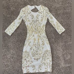 Backless short dress with gold sequins, perfect for a date night, glam night.